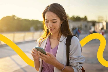 A woman walking with a phone